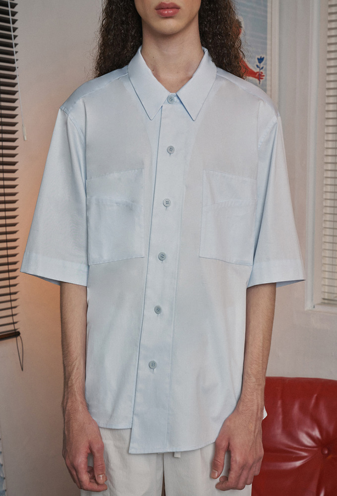 ASYMMETRY CURVED TWO POCKET SHIRTS SKY BLUE