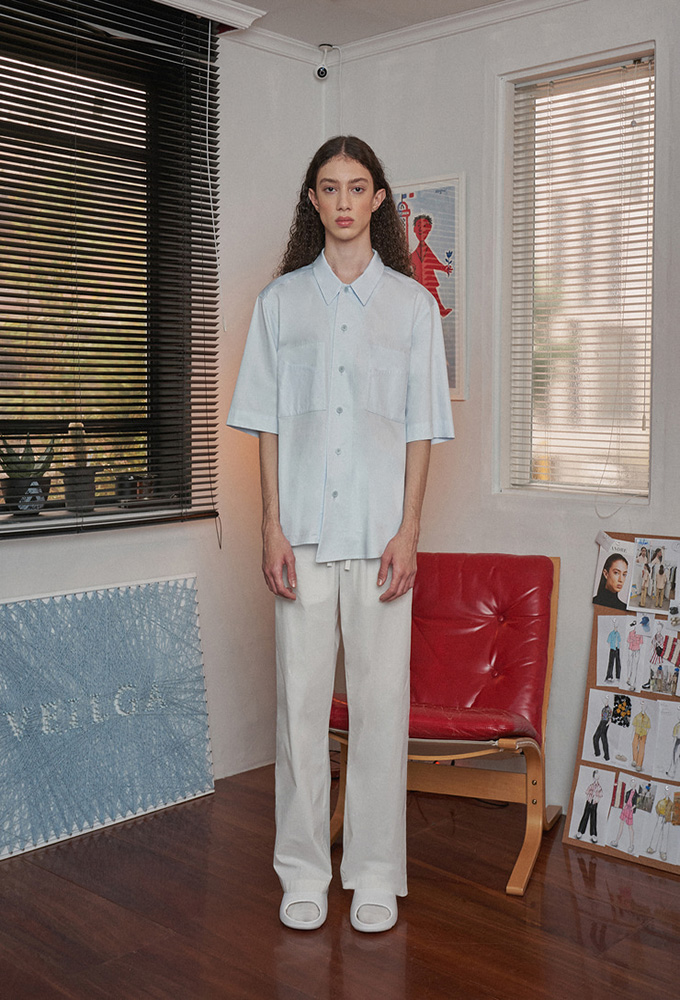 ASYMMETRY CURVED TWO POCKET SHIRTS SKY BLUE